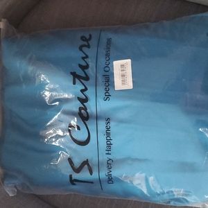 Ocean blue calf length dress with left shoulder bow detail and sweetheart waist.